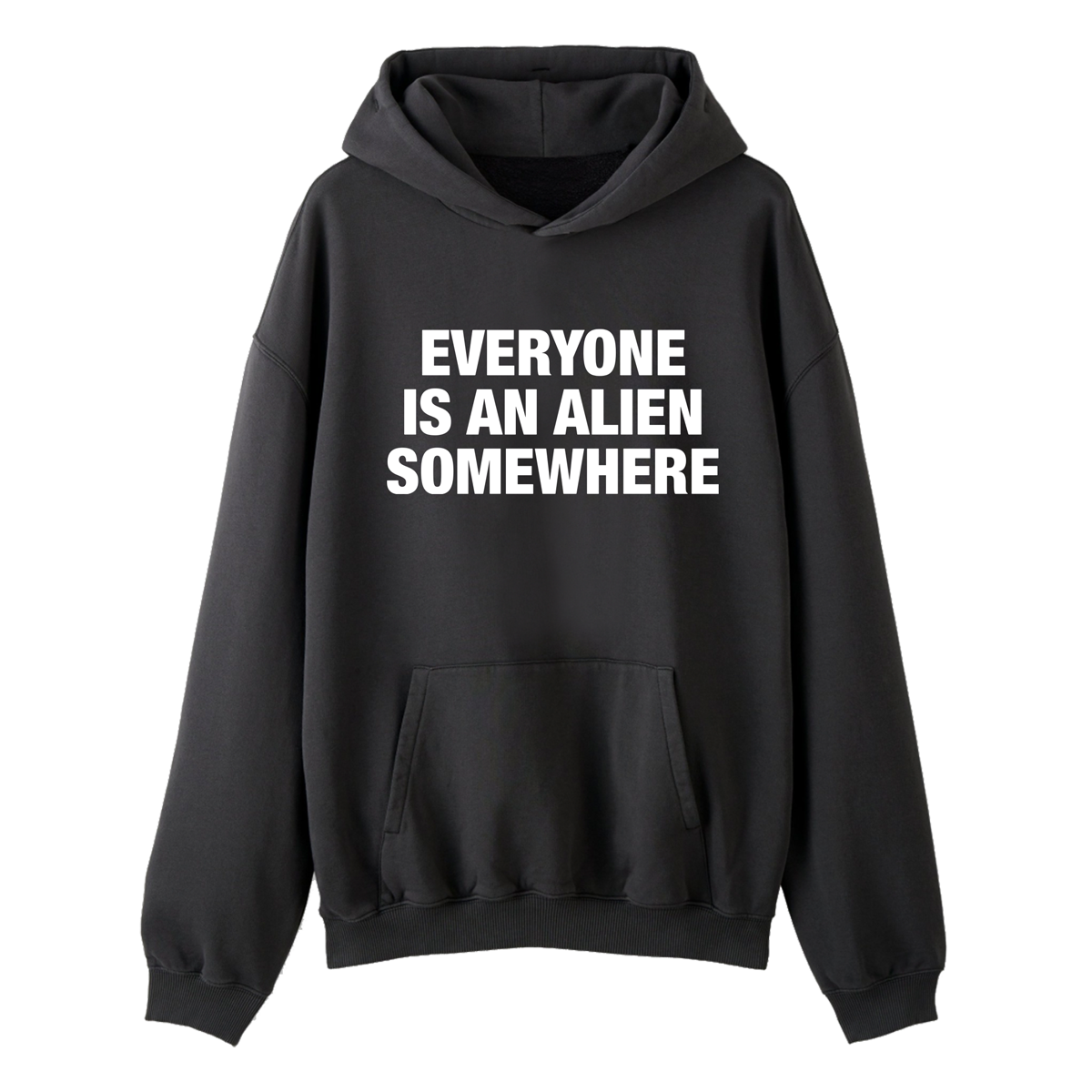 Front of a black hoodie, with EVERYONE IS AN ALIEN SOMEWHERE written in large, bold white letters. There’s a front kangaroo pocket open on both sides, allowing the wearer’s hands to access it from either side. The hood is spacious. The text is in 3 lines: EVERYONE, IS AN ALIEN, SOMEWHERE